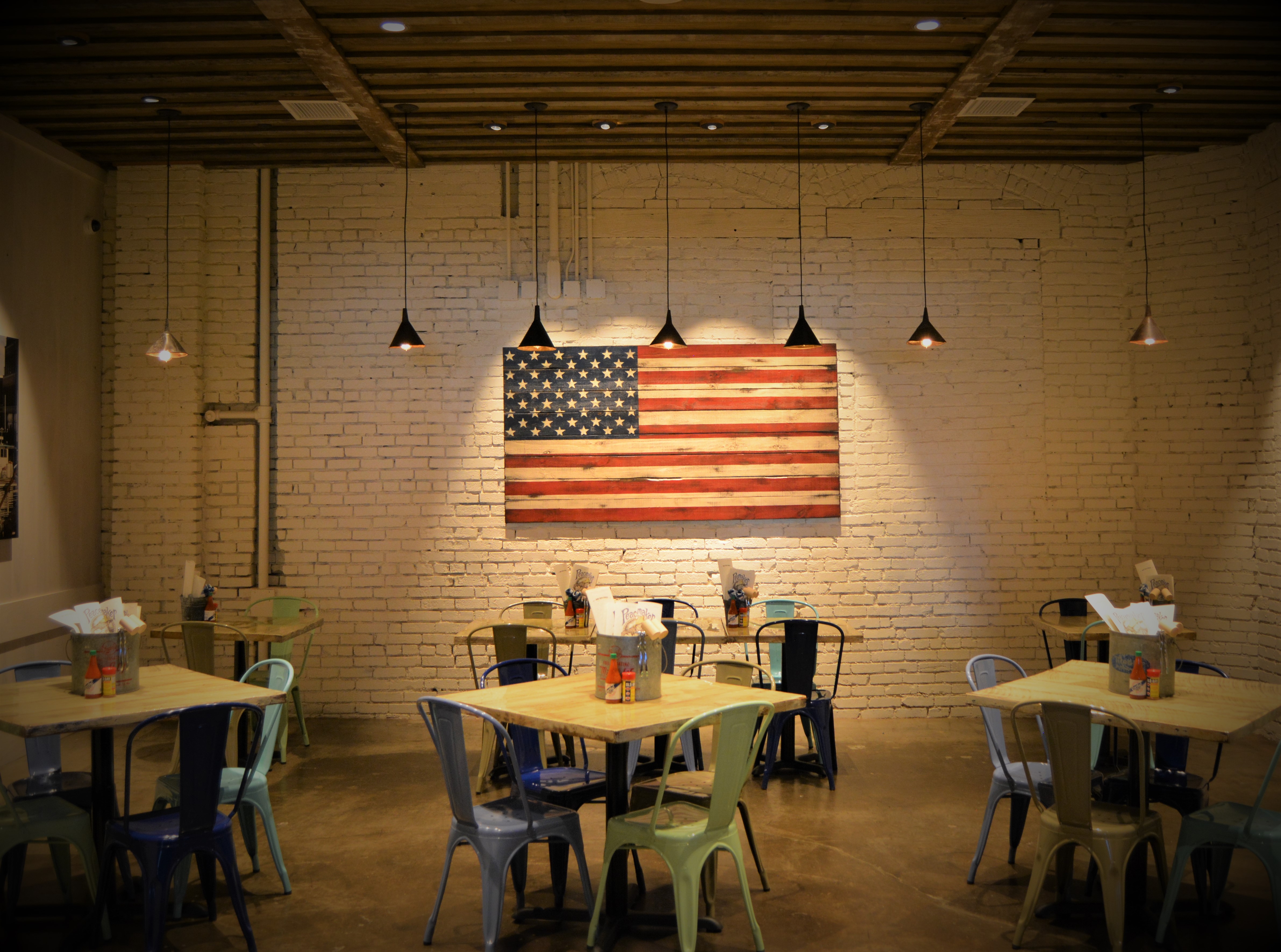 Peacemaker Lobster & Crab Co. Dining Area with American Flag Art