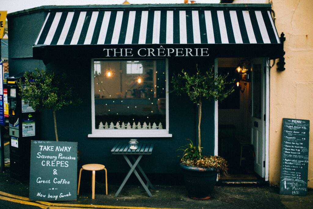 The Creperie Front of Retail/Restaurant Building